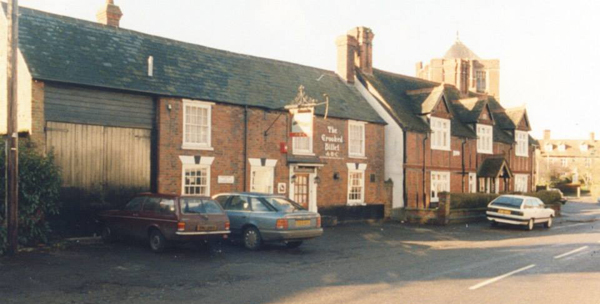 Front view of Crooked Billet with cars parked in front